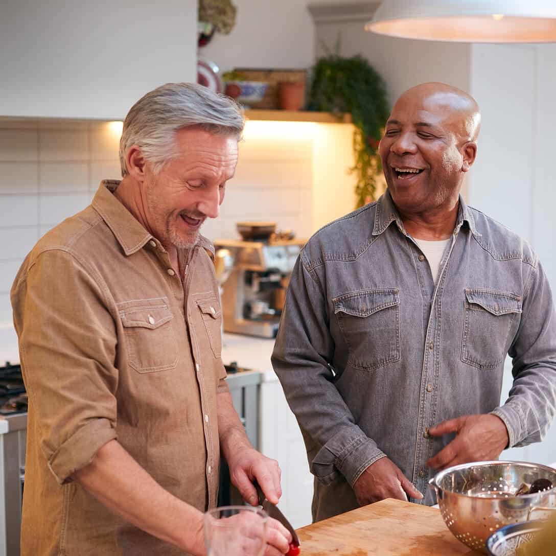 Two old men in a kitchen